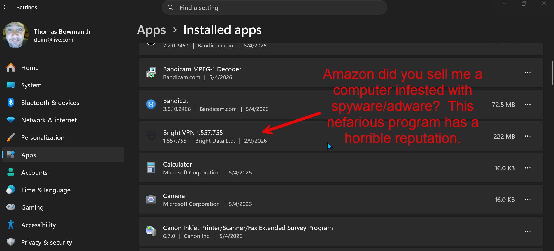 Windows Settings → Apps → Installed apps showing Bright VPN 1.557.755 by Bright Data Ltd., installation date 2/9/2026, with annotation: 'Amazon did you sell me a computer infested with spyware/adware? This nefarious program has a horrible reputation.'